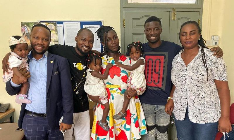 Kwaku Manu with Funny Face's family