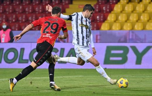 Juventus' Spanish forward Alvaro Morata (R) scored and was sent off against Benevento.