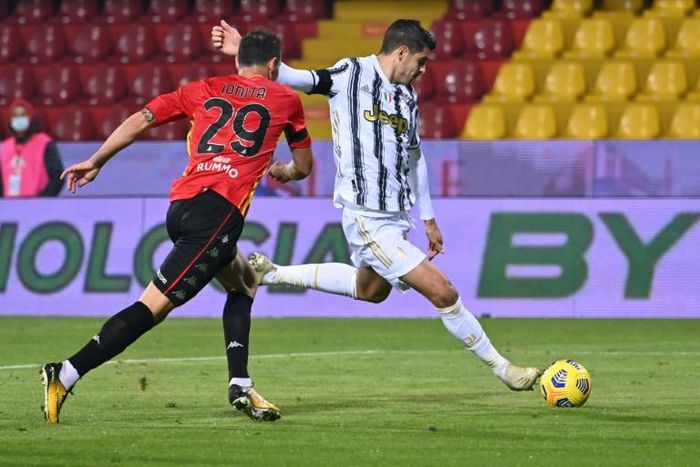 Juventus' Spanish forward Alvaro Morata (R) scored and was sent off against Benevento.