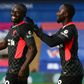 Liverpool forward Sadio Mane (left) celebrates scoring against Crystal Palace
