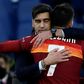 Under-pressure Roma coach Fonseca (L) congratulates Pellegrini after his last-gasp winner against Spezia