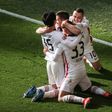 Frankfurt's Portuguese forward Andre Silva celebrates with teammates scoring a late winner against Borussia Dortmund on Saturday