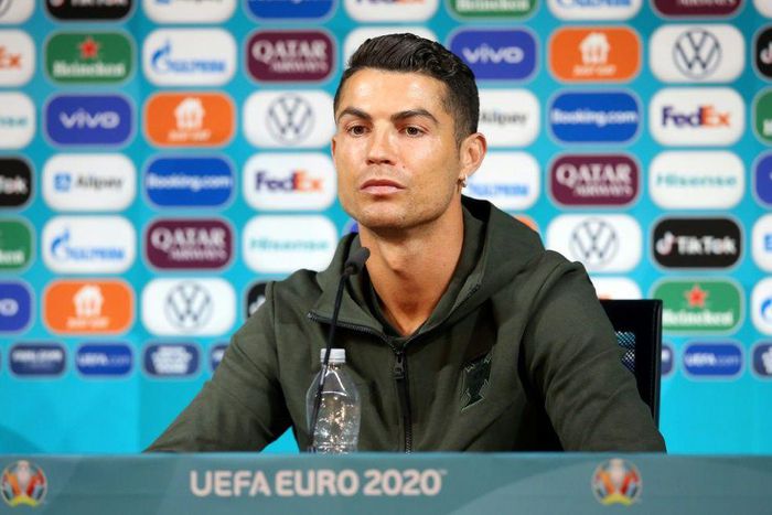 Cristiano Ronaldo, with Coca-Cola bottle removed
