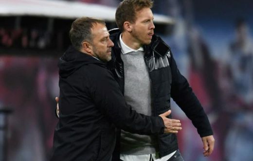 Leipzig head coach Julian Nagelsmann (R) hopes to put pressure on Bayern Munich and their boss Hansi Flick (L)