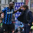 Romelu Lukaku (L) celebrates with coach Antonio Conte during Inter's victory in the Milan derby that put them four points clear at the top of Serie A