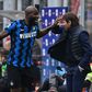 Romelu Lukaku (L) celebrates with coach Antonio Conte during Inter's victory in the Milan derby that put them four points clear at the top of Serie A