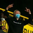 Injured Dortmund striker Erling Braut Haaland (R) celebrates his side's 3-2 win over RB Leipzig on Saturday