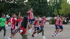 Atletico Madrid's players celebrate outside the Jose Zorilla Stadium after winning La Liga on Saturday.