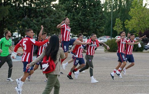 Atletico Madrid's players celebrate outside the Jose Zorilla Stadium after winning La Liga on Saturday.