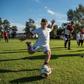 A child kicks a ball at the new football school for children with learning difficulties set up by Argentine team Newell's Old Boys