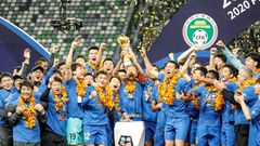 Jiangsu Suning celebrate beating Guangzhou Evergrande to win the Chinese Super League last month, but both clubs may have to change their names for next season