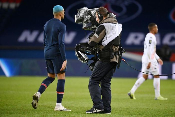 PSG superstar Kylian Mbappe walks past the camera -- the French league is hoping to agree a new domestic broadcast deal next week after the disastrous collapse of its record contract with Mediapro