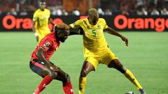 Golden Arrows defender Divine Lunga (R) playing for Zimbabwe against Uganda during the 2019 Africa Cup of Nations in Egypt.