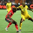 Golden Arrows defender Divine Lunga (R) playing for Zimbabwe against Uganda during the 2019 Africa Cup of Nations in Egypt.