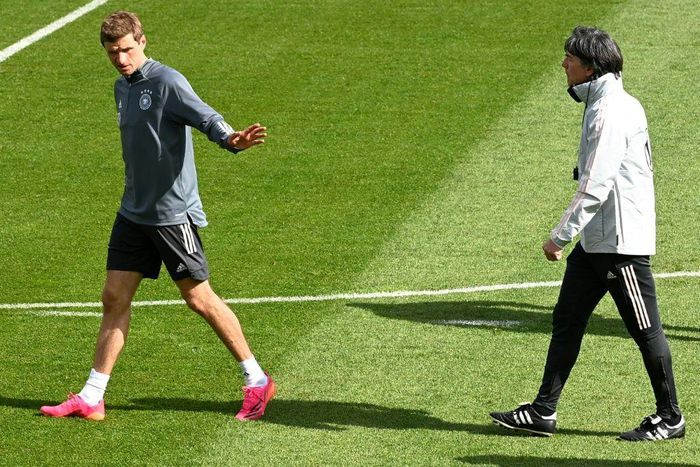 Thomas Mueller (L) is expected to make his first Germany appearance for nearly three years in Wednesday's friendly against Denmark