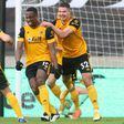 Ivory Coast international Willy Boly (C) celebrates scoring for Wolves against West Bromwich in the English Premier League.