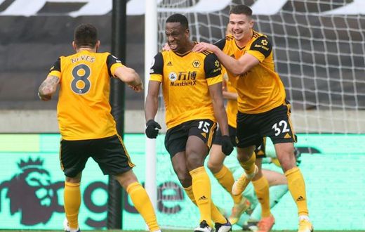 Ivory Coast international Willy Boly (C) celebrates scoring for Wolves against West Bromwich in the English Premier League.