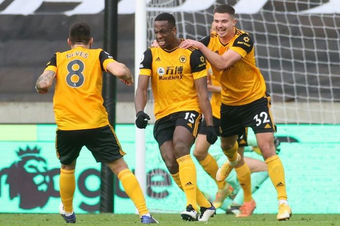 Ivory Coast international Willy Boly (C) celebrates scoring for Wolves against West Bromwich in the English Premier League.