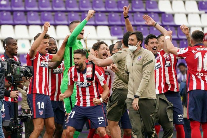 Atletico Madrid's players celebrate after winning the Spanish league