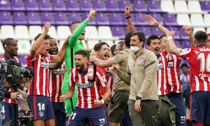 Atletico Madrid's players celebrate after winning the Spanish league