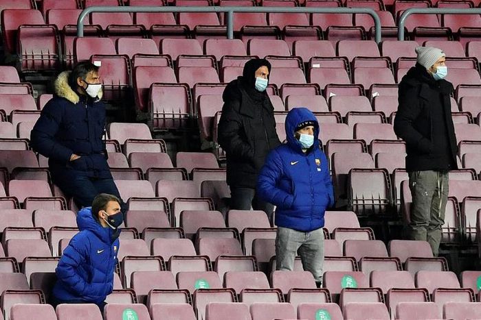 Masked superhero: Lionel Messi, in the centre in the back row, watches  Barcelona draw with Eibar