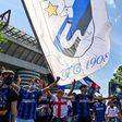 Inter Milan fans celebrate outside the San Siro.
