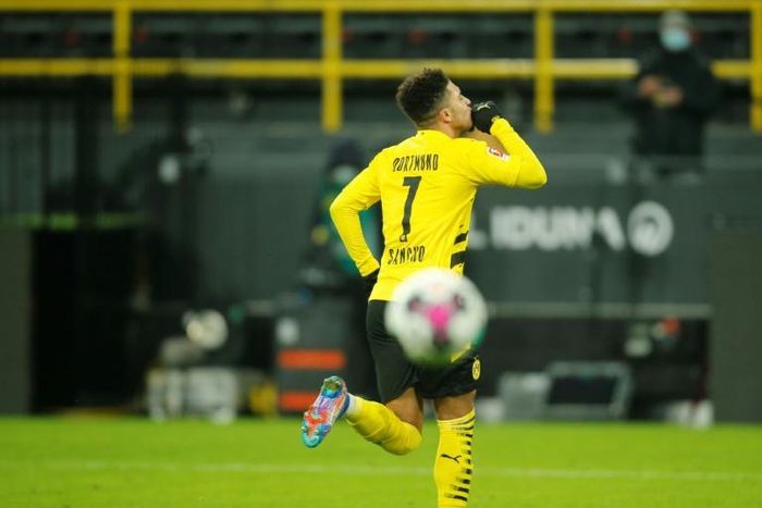 Dortmund winger Jadon Sancho celebrates scoring in Sunday's 2-0 win over Wolfsburg