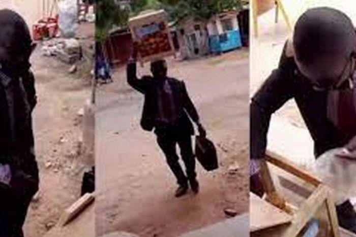 Bofrot seller in suit and tie with a briefcase in hand wins the hearts of buyers