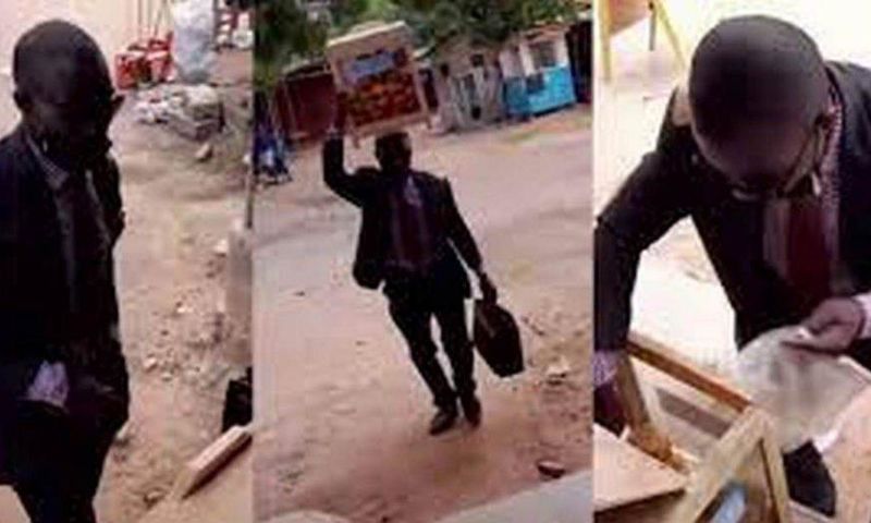 Bofrot seller in suit and tie with a briefcase in hand wins the hearts of buyers