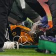 Wolves forward Raul Jimenez receives treatment after a clash of heads with Arsenal's David Luiz