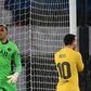 A Keylor Navas save from Lionel Messi's penalty helped secure Paris Saint-Germain's qualification for the Champions League quarter-finals at Barcelona's expense