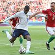 France's forward Ousmane Dembele (L) and Hungary's defender Attila Fiola vie during the UEFA EURO 2020 Group F football match between Hungary and France at Puskas Arena in Budapest on June 19, 2021.