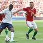 France's forward Ousmane Dembele (L) and Hungary's defender Attila Fiola vie during the UEFA EURO 2020 Group F football match between Hungary and France at Puskas Arena in Budapest on June 19, 2021.