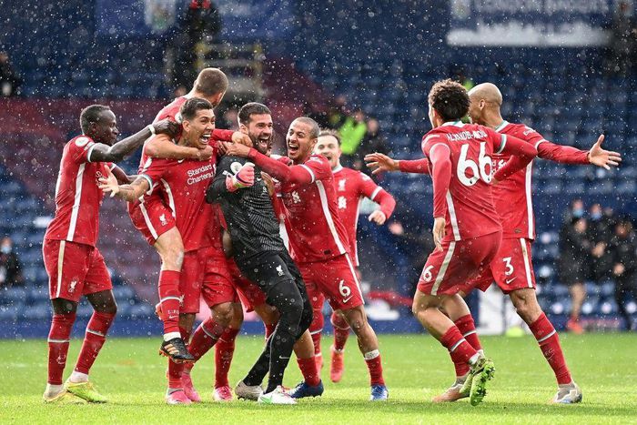 Alisson in wonderland: Liverpool goalkeeper Alisson Becker (in black) scored a stoppage time winner against West Brom
