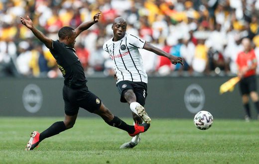 Midfielder Ben Motshwari (R) will be a key figure for Orlando Pirates when they face Enyimba in the CAF Confederation Cup in Nigeria