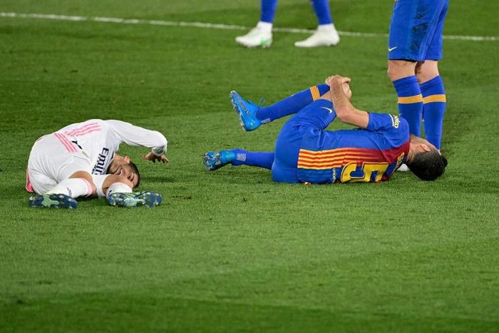 Lucas Vazquez (left) injured in Saturday's Clasico