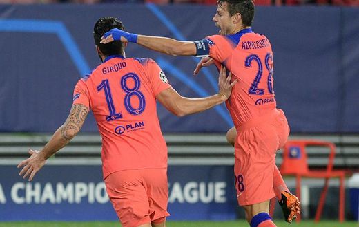 Giroud (L) produced a remarkable four-goal display