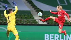 Emil Forsberg (R) scores the winning goal in Friday's German Cup semi-final
