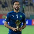 Morocco and Raja Casablanca star Anas Zniti holds the trophy awarded to the best goalkeeper after the African Nations Championship in Cameroon this year