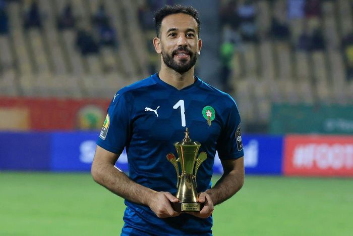 Morocco and Raja Casablanca star Anas Zniti holds the trophy awarded to the best goalkeeper after the African Nations Championship in Cameroon this year