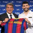 Sergio Aguero (right) was unveiled as a Barcelona player by club president Joan Laporta