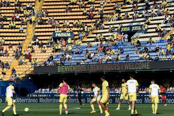 Home again: Villarreal fans watch their team warm up