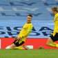 Marco Reus (L) celebrates after scoring at Manchester City on Tuesday