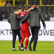 Bayern Munich midfielder Joshua Kimmich (C) has been out since suffering knee injury in the league game at Dortmund in early November