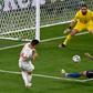 Swiss midfielder Steven Zuber (L) had a shot saved by Gianluigi Donnarumma (C)