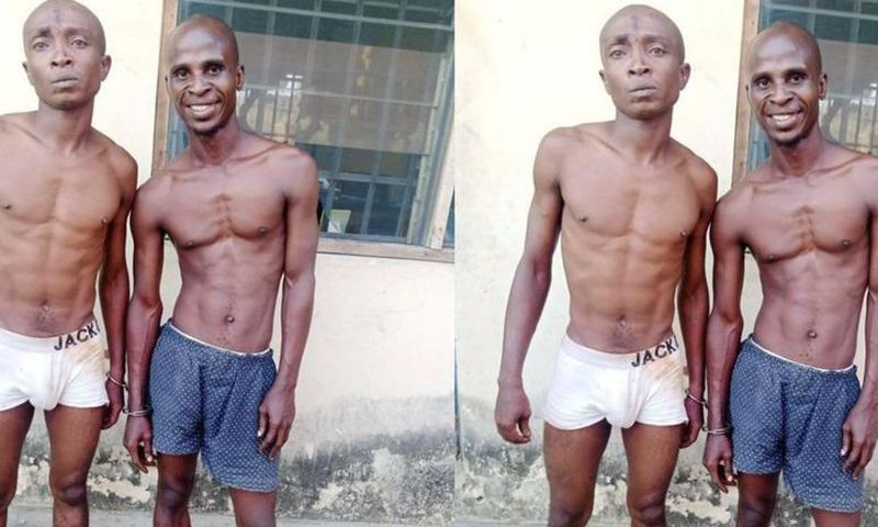 Suspected robbers pose for the cameras after being arrested by security operatives