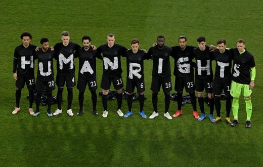 Germany's players with the wording "Human rights" on their T-shirts before Thursday's 3-0 win over Iceland in a 2022 World Cup qualifier in Duisburg