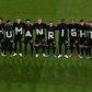 Germany's players pose for a group photo with the wording "Human rights" on their T-shirts prior to the their World Cup qualifier with Iceland