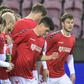 Denmark players wearing T-shirts with "Football supports change" written on them before the win over Moldova on March 28