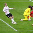 Leroy Sane (R) celebrates scoring Bayern Munich's final goal in a 6-0 thrashing of Moenchengladbach